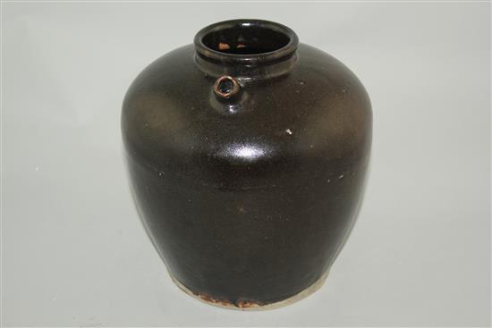 A Chinese Henan ware black glazed ovoid jar, Song dynasty, 23.5cm